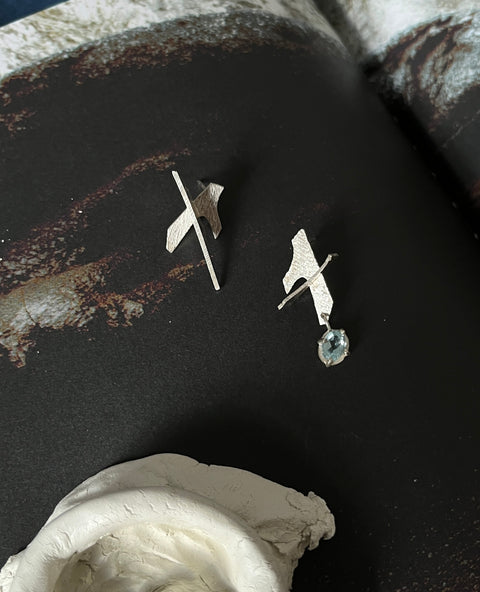 Modern earrings inspired by movement and structure